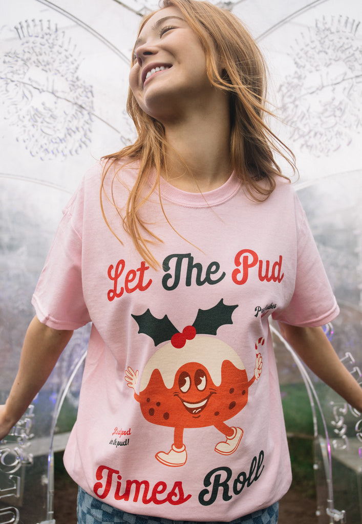 female model wears positive vintage style christmas slogan t shirt with christmas pudding character
