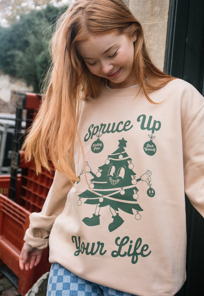 womens vintage style christmas jumper with happy christmas tree graphic