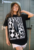Model wears 90s style graphic tshirt