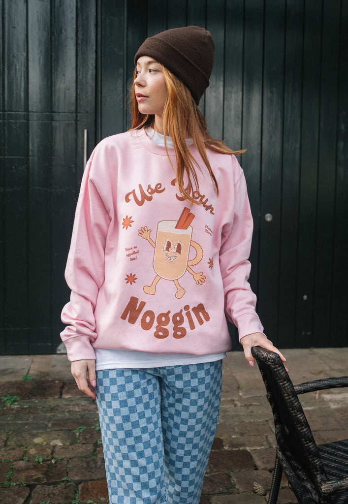 womens pink sweater with vintage egg nog graphic