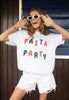 Model wears white tshirt with Pasta Party slogan