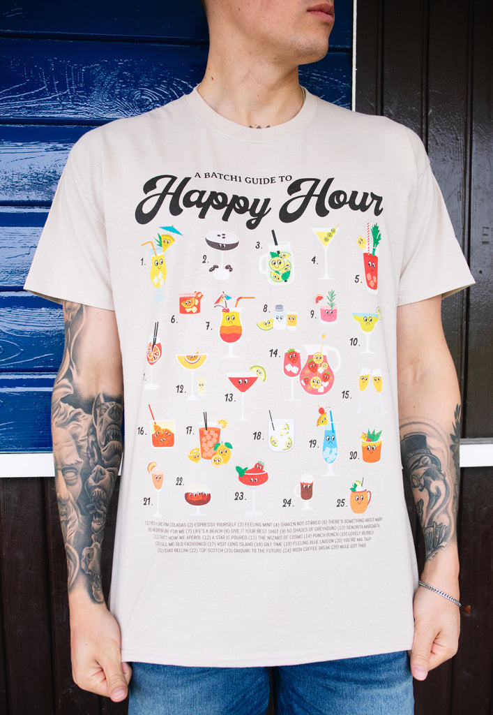 Model wears sand tshirt with Happy Hour slogan and cocktail guide character graphic 