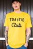 Model wears mustard tshirt with Toastie Club slogan 