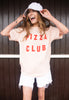 Model wears dusty peach tshirt with Pizza Club slogan