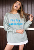 Model wears fun summer slogan sweatshirt 