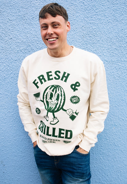 Model wears vanilla sweatshirt with fresh and chilled graphic 