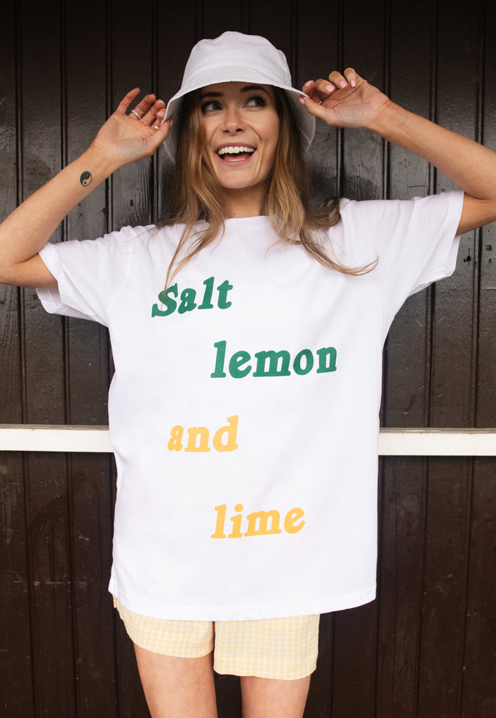 Model wears fun summer slogan tshirt