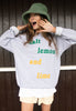 Model wears grey sweatshirt with Salt Lemon and Lime slogan