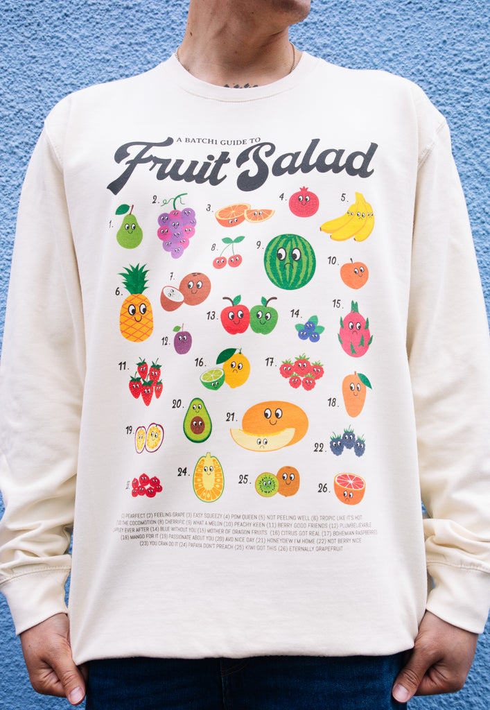 Model wears vanilla sweatshirt with fruit salad printed graphic 