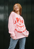 pastel pink christmas jumper with cute mince pie graphic