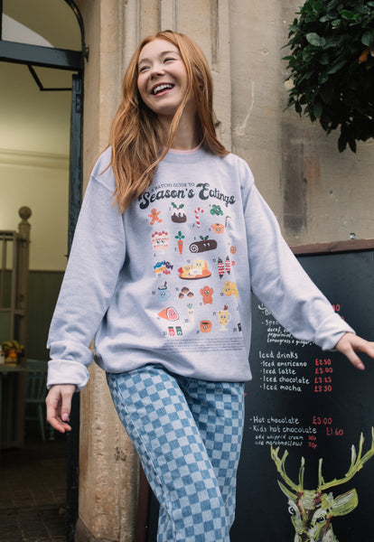 Fun christmas jumper in grey with illustrated festive food
