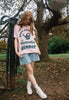model wears slouchy fit pink christmas t shirt with christmas gardening slogan print in green