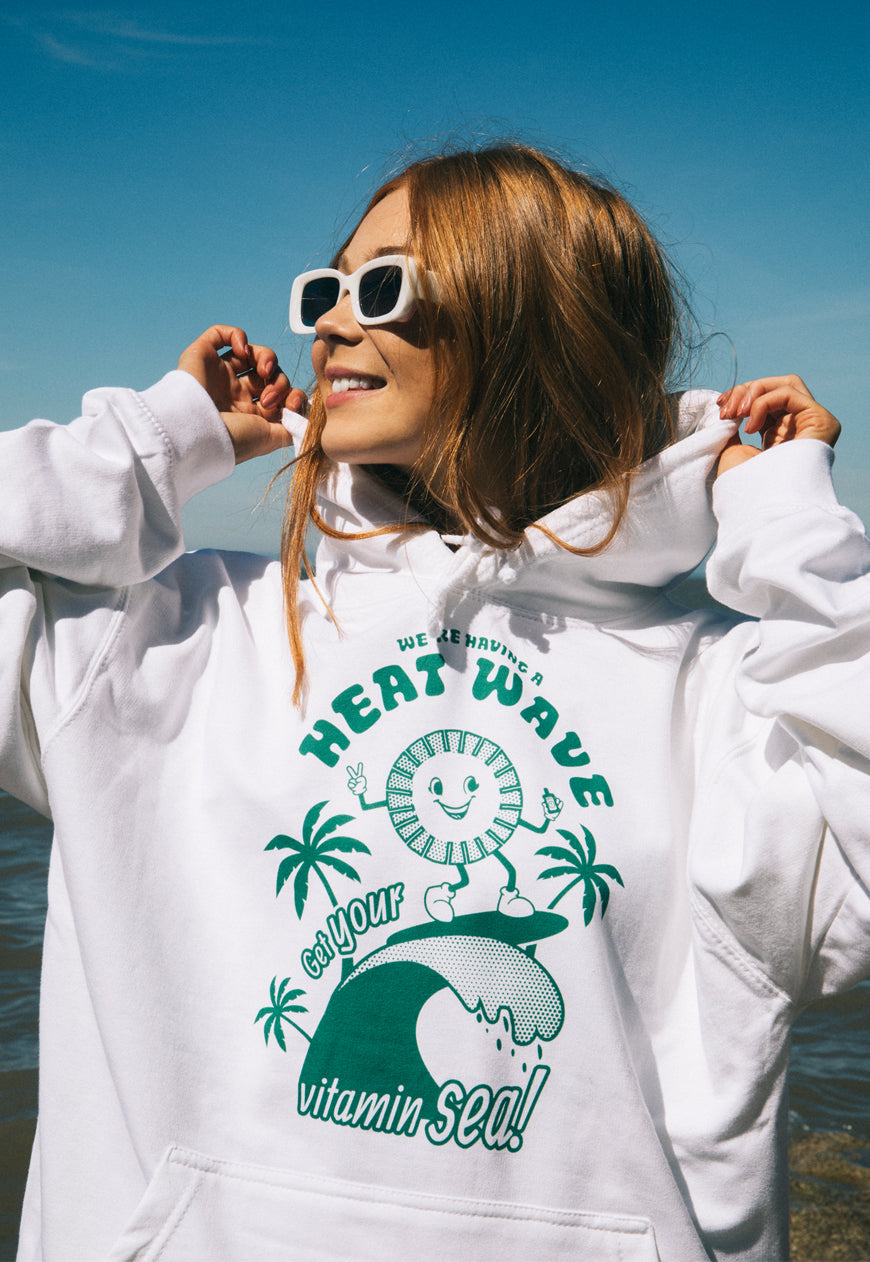 Heat Wave Women s Slogan Hoodie With Surfing Sun Graphic Batch1