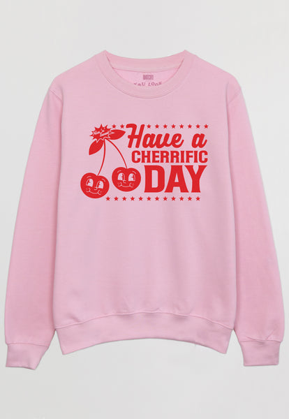Flatlay of pink sweater with printed cherry logo on front and cherry pun slogan