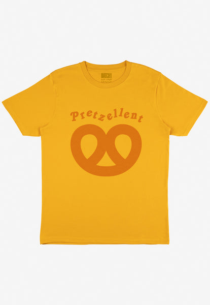flatlay of mustard tshirt with Pretzellent slogan and Pretzel graphic 