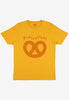 flatlay of mustard tshirt with Pretzellent slogan and Pretzel graphic 