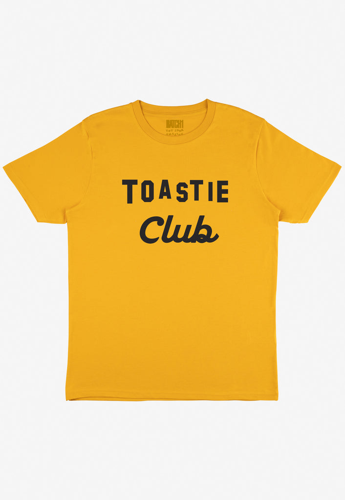 Flatlay of mustard tshirt with Toastie Club slogan 