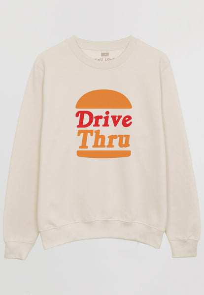 Flatlay of vanilla sweatshirt with Drive Thru slogan and burger graphic