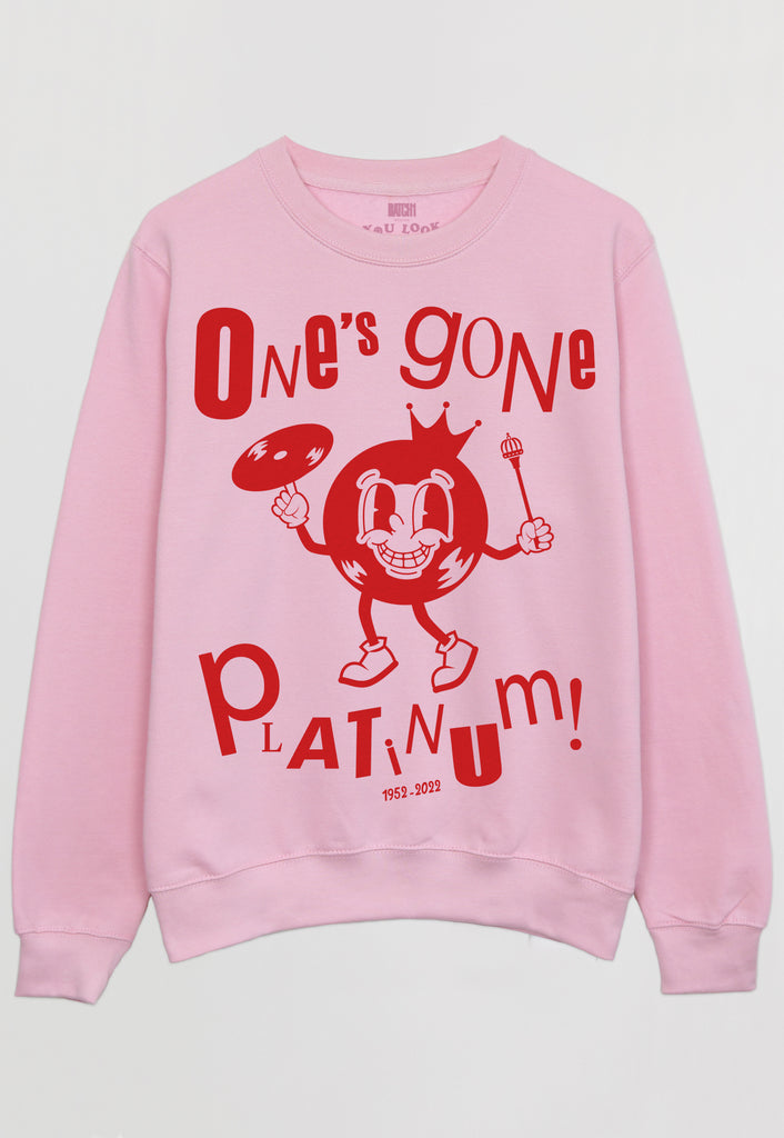 Flatlay of pink sweatshirt with "One's Gone Platinum"Jubilee slogan 