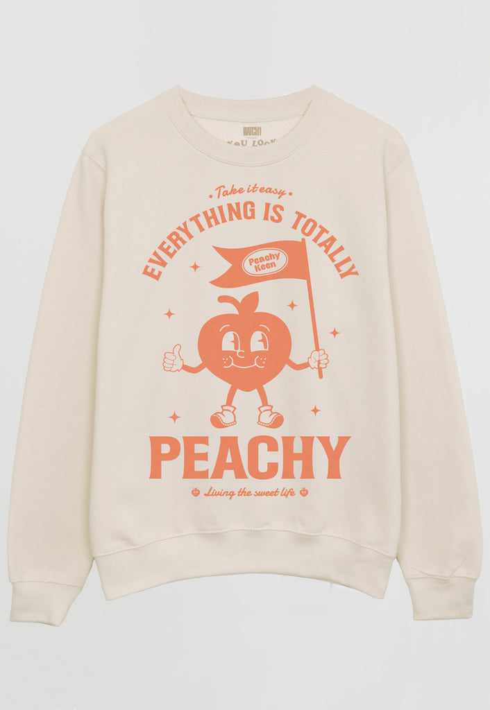Flatlay image of women's sweatshirt with positive slogan peach graphic