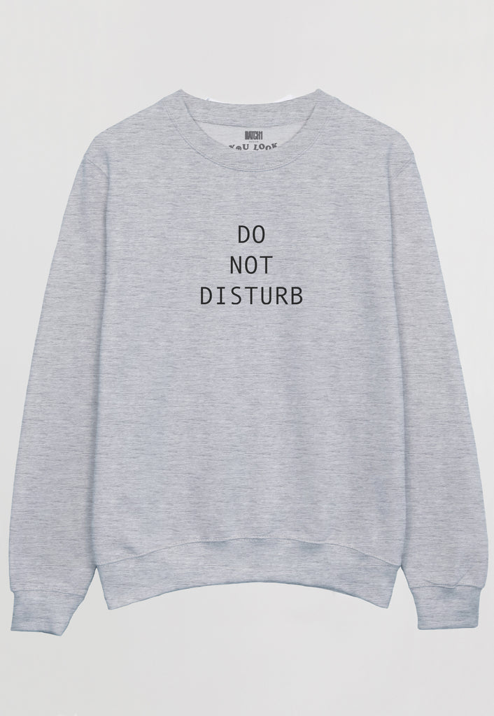 Flatlay of Do Not Disturb slogan sweatshirt