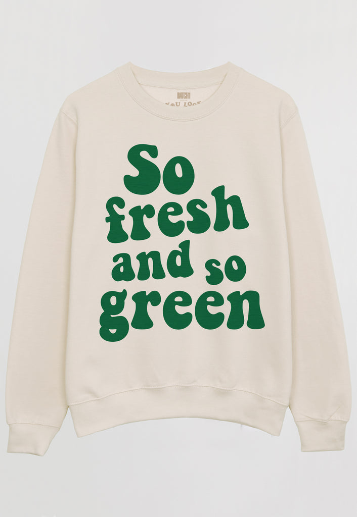 Flatlay of vanilla sweatshirt with so fresh and so green slogan 