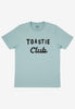 Flatlay of dusty green tshirt with Toastie club slogan 