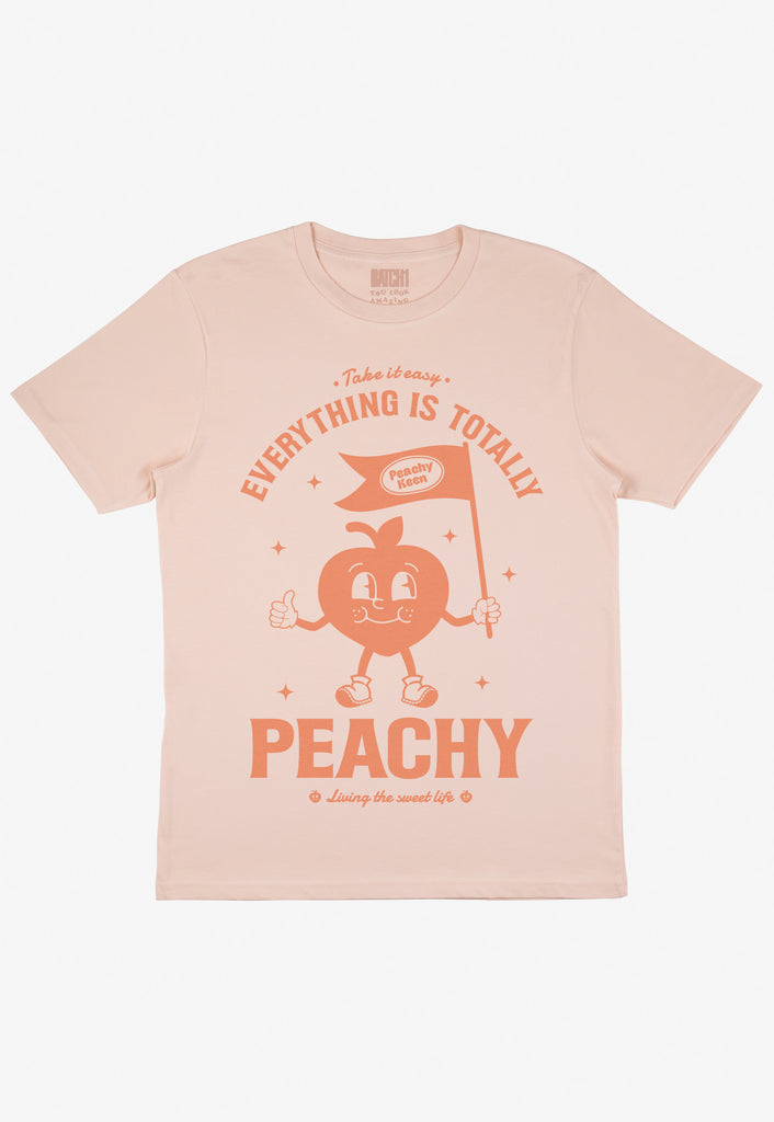Flatlay of Everything Is Totally Peachy slogan tshirt