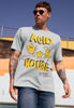 Model wears dusty green tshirt with Acid House festival slogan and lemon character graphic 
